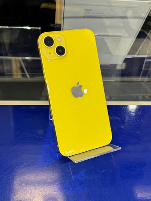 Yellow smartphone with Apple logo on a blue surface