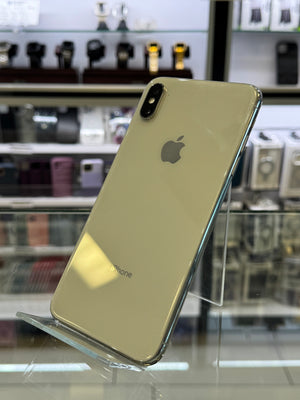 Silver iPhone X on display in a store with blurred background