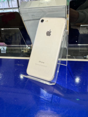 Phone with Apple logo on a blue surface
