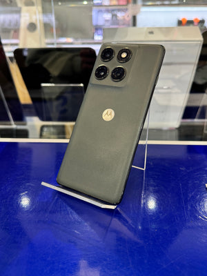 Motorola phone on a stand in a store setting