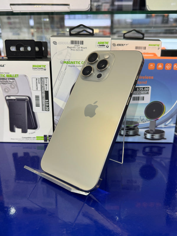 Silver smartphone on a stand with magnetic car mount packaging in the background