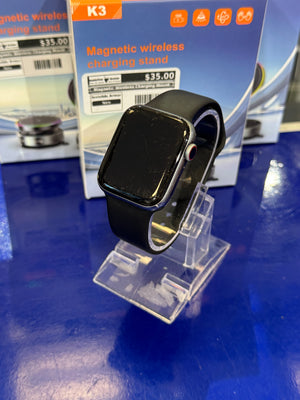 Smartwatch on a clear stand with a blue background