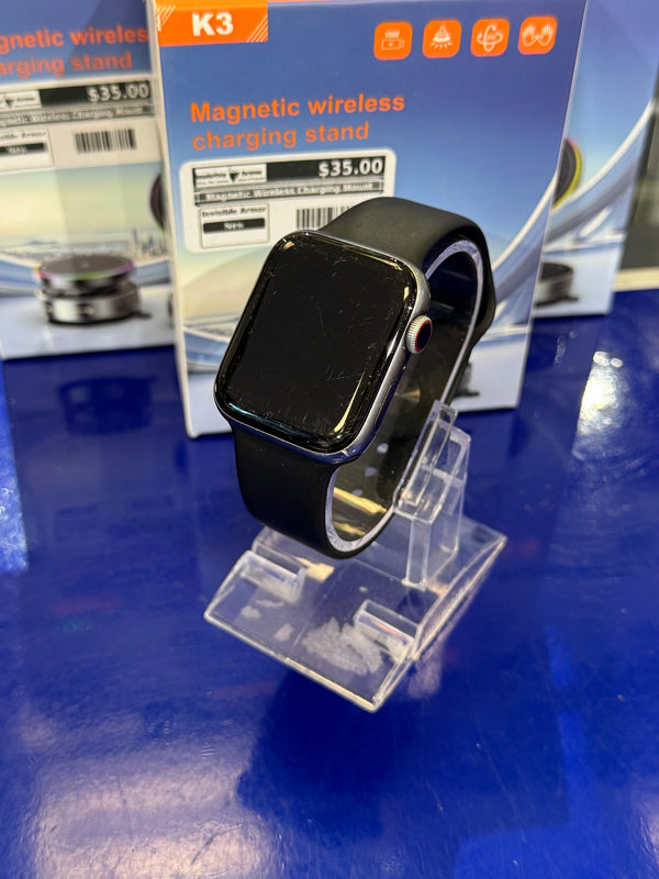 Smartwatch on a clear stand with a blue background
