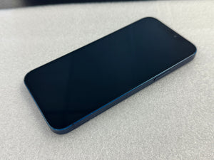 A dark blue smartphone with a black screen lies diagonally on a textured light gray surface.