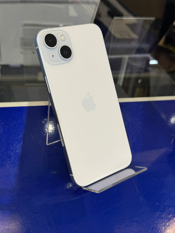 White smartphone on a blue surface