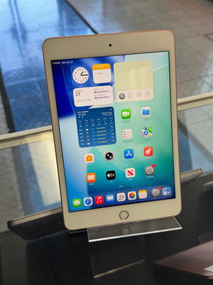 Tablet device with a display showing app icons on a stand.