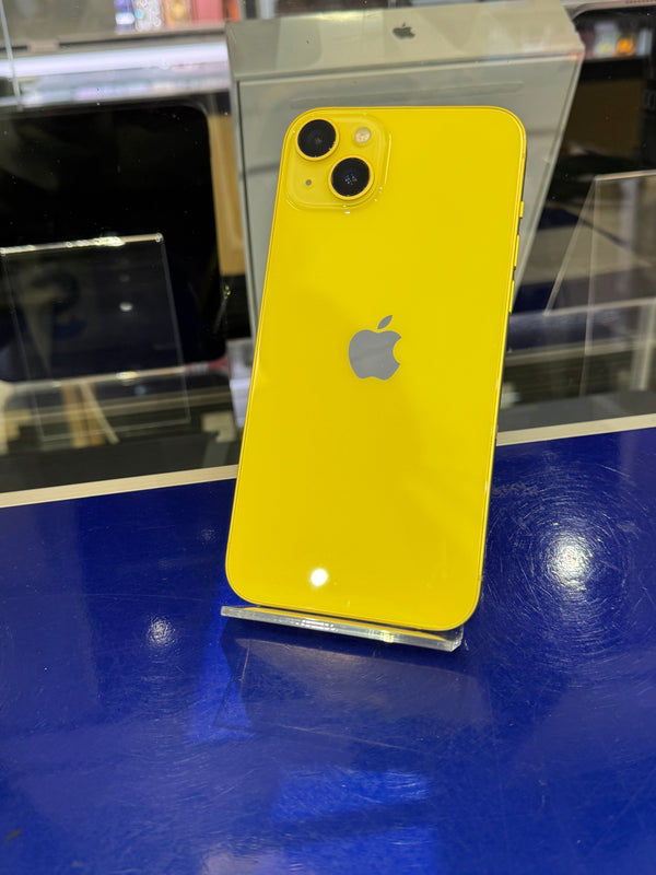 Yellow smartphone with Apple logo on a blue surface