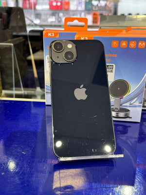 Black smartphone on a stand with 'K3' packaging in the background