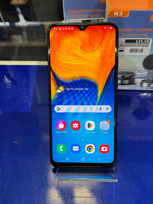 Smartphone on a stand with a colorful display in a store setting