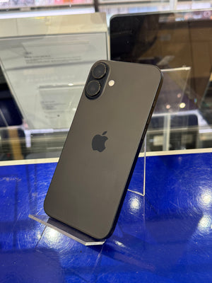 Black smartphone on a stand with a blurred background