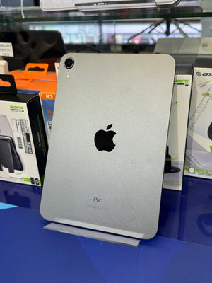 Silver iPad on display with Apple logo in a store setting