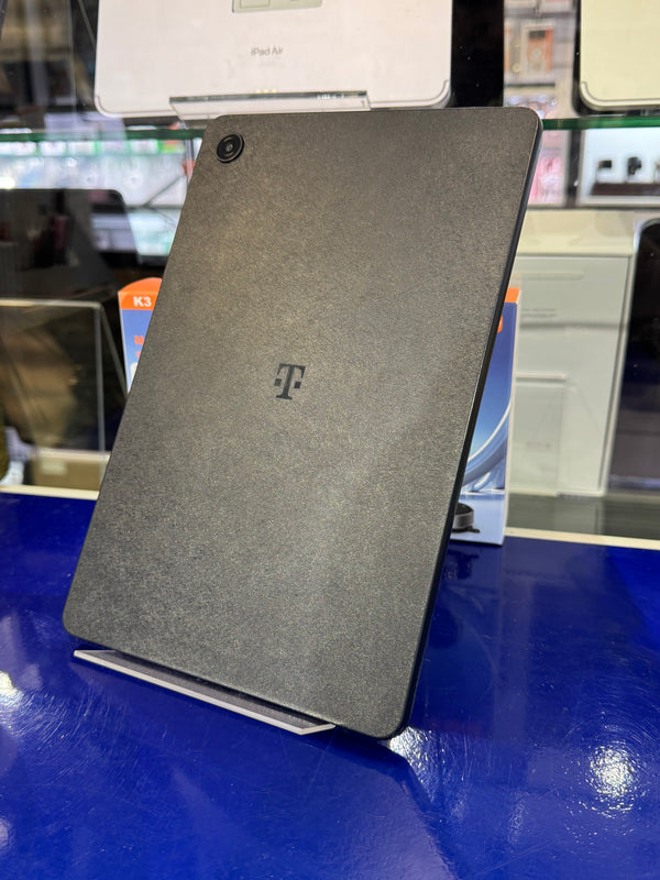 Gray tablet case with a logo on a blue surface