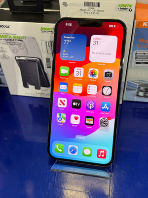 Smartphone with colorful display on a blue surface