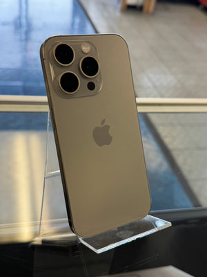 Gold iPhone 12 Pro Max on a reflective surface