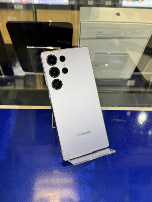 Samsung smartphone on display with a blue background
