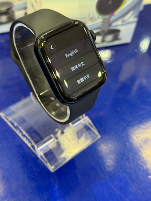 Smartwatch with a black band on a blue background
