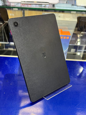 Black tablet with T-Mobile logo on a blue surface