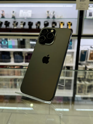 Smartphone with Apple logo on a reflective surface