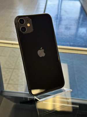 Black smartphone with Apple logo on a reflective surface