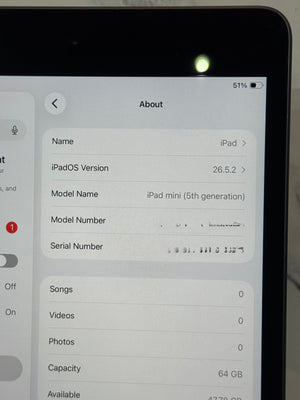 Close-up of an iPad screen showing the 'About' screen with iPadOS Version 26.5.