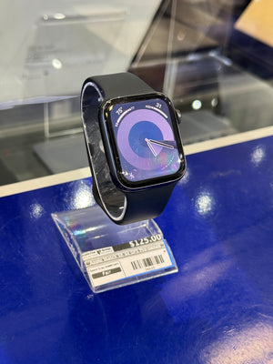 Smartwatch on display with a blue background