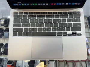 Close-up of a laptop keyboard with a blurred background