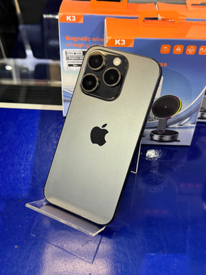 Silver smartphone on a stand with a blurred background