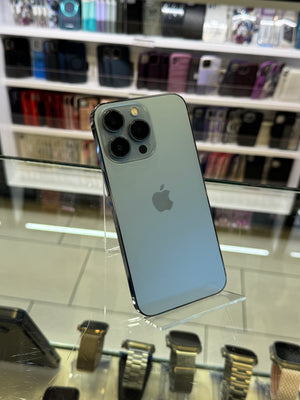Back view of an iPhone with a blurred store interior in the background
