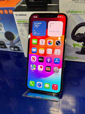 Smartphone with app icons displayed on a blue surface with product packaging in the background