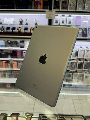 Back view of an Apple iPad on display in a store