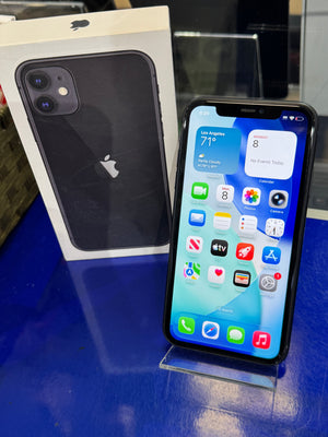 Smartphone with app icons displayed on screen above an Apple product box
