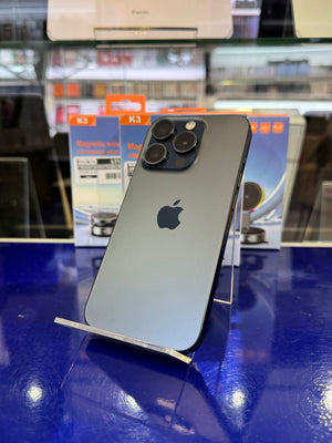 Smartphone on a stand with blurred store background