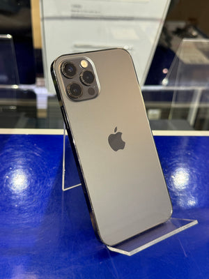 Silver iPhone with Apple logo on a blue surface