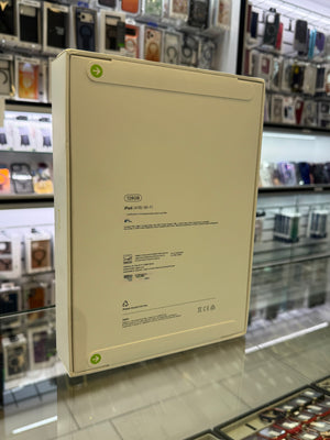The back of an Apple iPad box displayed in a store setting. 
