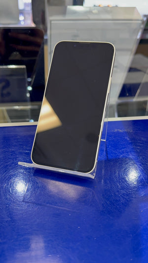 Smartphone on a stand with a blue surface and blurred background