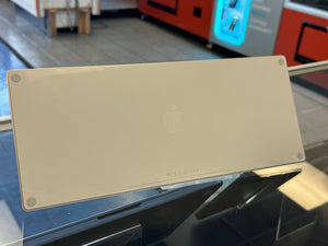 Back side of an Apple keyboard on a stand