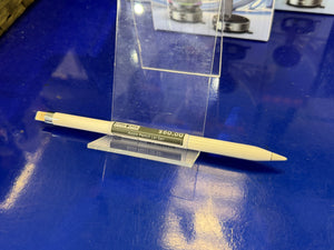 White Apple pen with a price tag on a blue surface