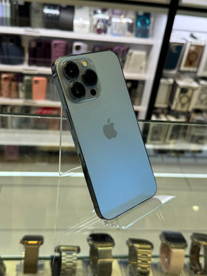 Smartphone with Apple logo on a reflective surface