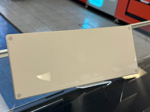 Back side of an Apple keyboard on a stand
