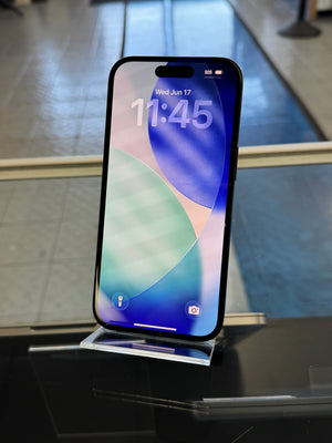 Smartphone on a stand with a colorful display in an indoor setting