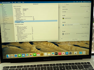 Laptop screen displaying system information on a Mac