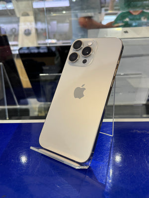 White smartphone with Apple logo on a blue surface