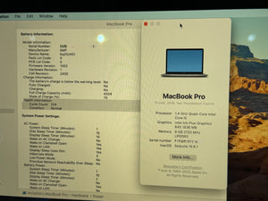 A close-up of a MacBook Pro computer screen showing battery and system information.