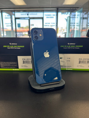 A blue Apple iPhone with the back of the phone facing forward, standing on a black charging dock on a dark counter. Behind it are two black and green BoEOLLE 20W PD & FC Fast Chargers.