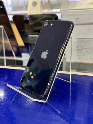 Black smartphone with Apple logo on a blue surface