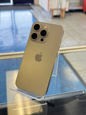 iPhone 12 Pro Max on a stand with blurred indoor background