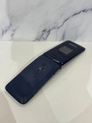 A dark Alcatel flip phone in an open position displaying a singular camera and black screen. 