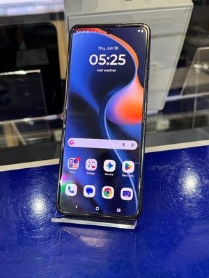 Smartphone on a stand with a blue background