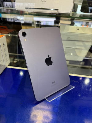 Silver Apple iPad on a stand with blurred background