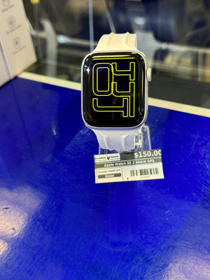 Apple Watch on display with a price tag in a store setting
